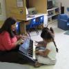Wendy teaching keyboard to pre-schoolers